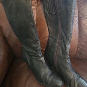 Sleek Black Leather Heeled Boots